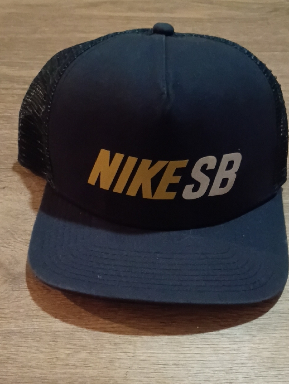 Nike SB Navy Mesh Trucker Hat with Yellow and White Logo